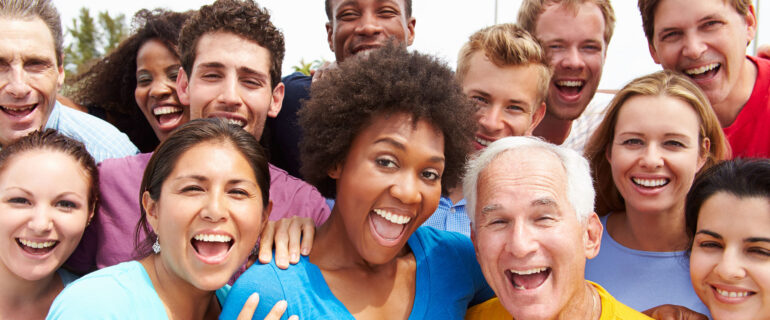 33525351 - outdoor portrait of multi-ethnic crowd